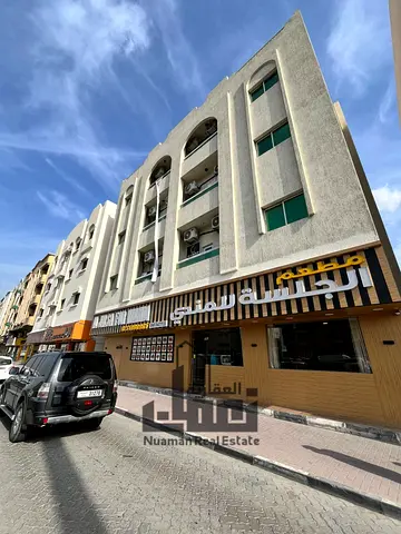 Premium Investment Building for Sale in Muwaileh – Main Street, Ground + 3 Floors, Fully Rented,Stable Annual Income with Excellent Returns