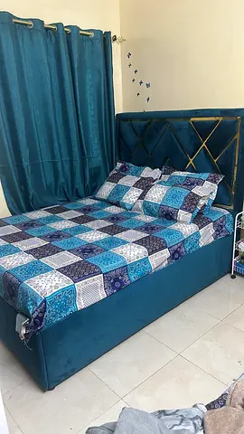 Elegant Queen Bed with Plush Headboard