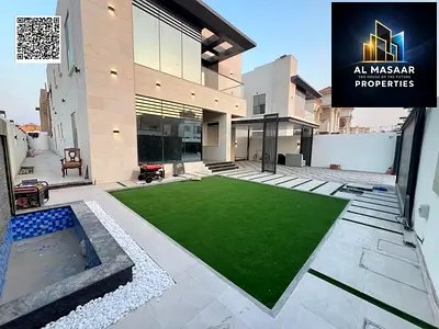 Luxury villa with a modern design, 5000 sq ft, with a garden, behind Ajman Academy. Price includes air conditioning and is negotiable.