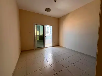 One bedroom and living room in Al Majaz 3, balcony, open view and parking inside the building, 38,000 dirhams.