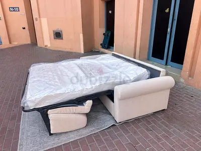 Natuzzi two seater sofa bed with mattress