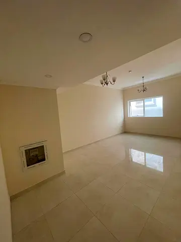 Elegant apartment for rent in Muwaileh, spacious 1BR with 2 bathrooms, modern building, prime location close to all services.