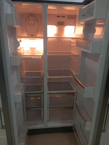 Siemens side by side refrigerator stainless steel body same like new