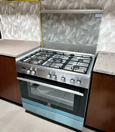 Electrolux Dual Fuel Top Gas Oven electric cooker 90 by 60 cm