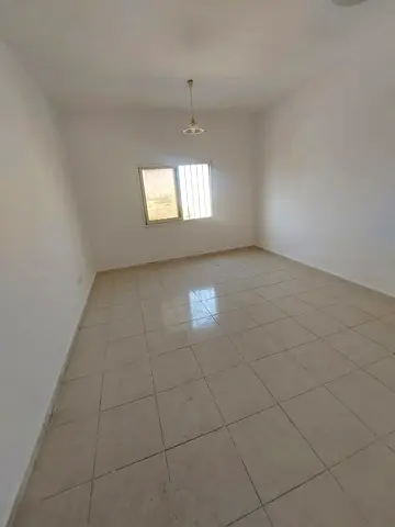 💯 Annual Rent in Ajman 💦 One-bedroom apartment with living room, kitchen, bathroom, and balcony. Central air conditioning. 🏡 Location: Al Rashidi