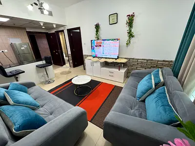 One bedroom and living room for sale in City Tower with an open view of Sharjah. Sold furnished with parking. Total price: AED 390,000 cash. Area: 757