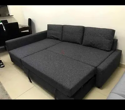 Elegant Living Room Sofa Bed Grey fabric Sofa Bed with soft cushions and smooth finishing. Converts
