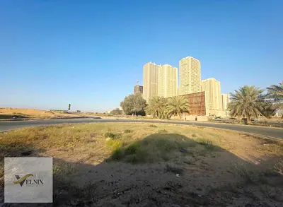 أرض تجاري سكني تملك حر G+6P+15 على شارع الشيخ محمد بن زايد (E311) مباشرة – العالية عجمان
