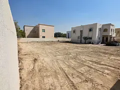 Prime residential land for sale in Ramtha – second plot from the main road, measuring 7,000 sq ft.