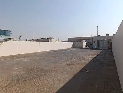 A High-Demand Investment Opportunity in the Scrap Area _ Fenced Open Yard Land for Sale in Sajaa – Al Hanou