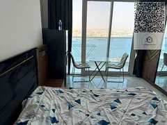 Studio in Al Waha Towers, featuring parking, gym, swimming pool, garden, security and guards, with a