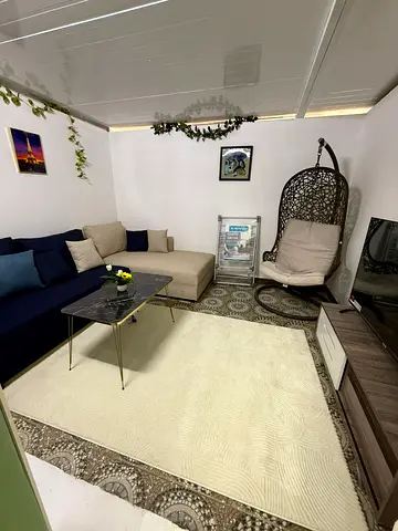 Largest studio apartment for monthly rent opposite City Centre Ajman, furnished with hotel-style furniture.
