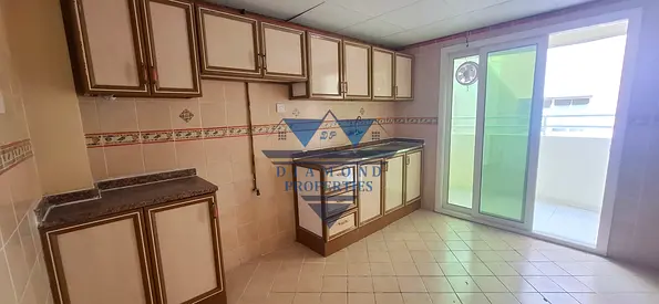 Very spacious and beautiful place neat and clean building and flat 2bhk 38k in al nad Qasimia white house similar