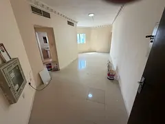 Two-bedroom apartment for rent in Al Nuaimiya, Ajman, directly on Kuwait Street. Master bedroom, two