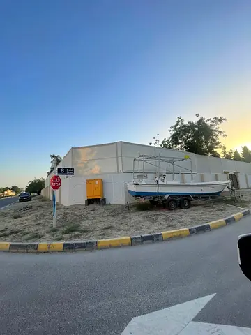 Royal Opportunity: Massive Corner Plot in Al Qarayen 2 Opposite the Mosque.