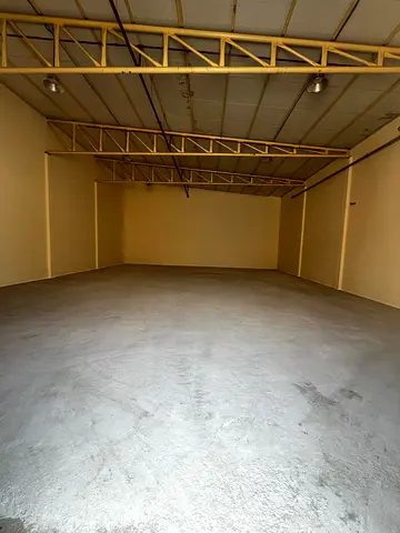 In Umm Al Quwain, a covered warehouse is available, 2500 sq ft, exclusive price 90,000 AED, suitable for storage and manufacturing.