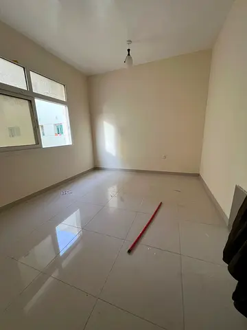 Bedroom and living room in Al Naba’ah, family only, balcony, central AC and gas, rent AED 25,000, 4 cheques.