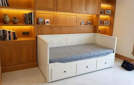 Stylish Daybed: Contemporary look with neat edges and premium wooden construction.