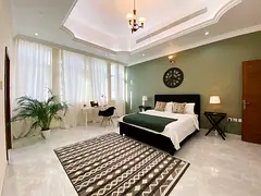 Bright  Spacious Master Bedroom by Burj Al Arab