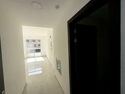 A bedroom and a living room, two bathrooms with a balcony in Al Muwaihat 3, second floor, large space on the main street, close to the Mohamed Bin Zay