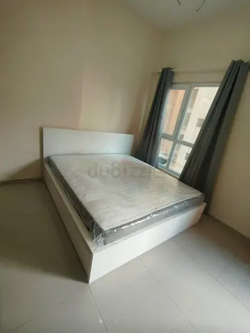 IKEA malam king size bed with IKEA mattress 180×200cm and 2 storage drawers underneath the bed