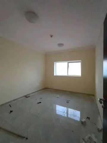 2BR apartment for rent in Al Majaz 2 Sharjah, 2 baths, kitchen, central AC, free parking, prime location, 47000 AED, 4 payments, 3000 deposit!