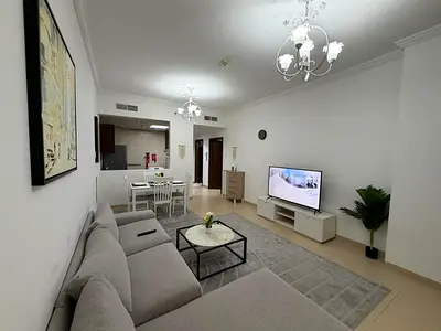 Furnished one-bedroom apartment for monthly rent in Ajman, first tenant, spacious, opposite City Centre, all utilities included.