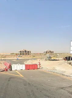 Prime corner residential plot for sale in Al-Hawshi area