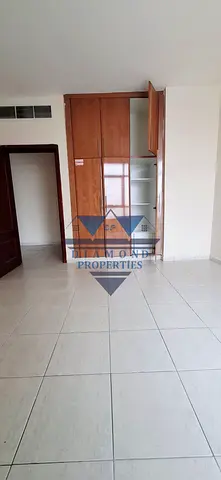 Beuty full apartment spacious flat 1bhk open view central Ac hall close 34k family building good location in al Qasimia