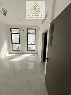 A one-bedroom apartment with a living room and two bathrooms, currently occupied, in one of the larg