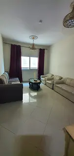 For Rent: 1-Bedroom + Living Room Apartment in Al Majaz 3 – Side View, Spacious Layout