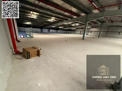 مستودع ضخم للإيجار السنوي بالجرف الصناعية 2 بمساحة 14000 قدم مربع جاهز للاستخدام الفوري مناسب لجميع الأنشطة الصناعية والتخزينية مع دفعات 4 وتأمين 10%