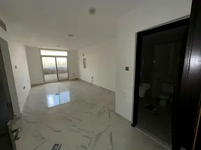 Two rooms and a large living room, second occupancy in Al-Muwayhat 3, on the main street.