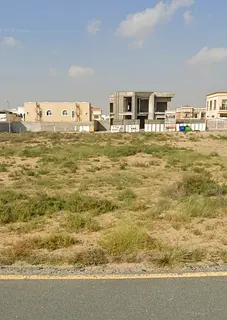 Residential land for sale in Al Hooshi area, Sharjah.