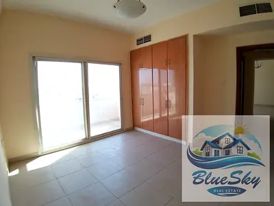 Family building 2BHK With Balcony wardrobe close to abu Shagara Park rent 40k