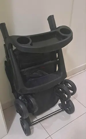 Barely used Compact Folding Stroller in excellent condition,Brand-Juniors