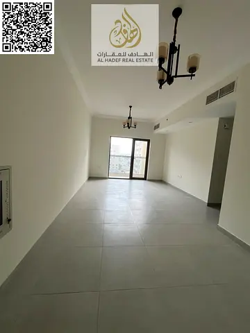 Two bedrooms and a living room, first occupancy, large area with 3 bathrooms and a gym inside the tower in Al Jurf 2