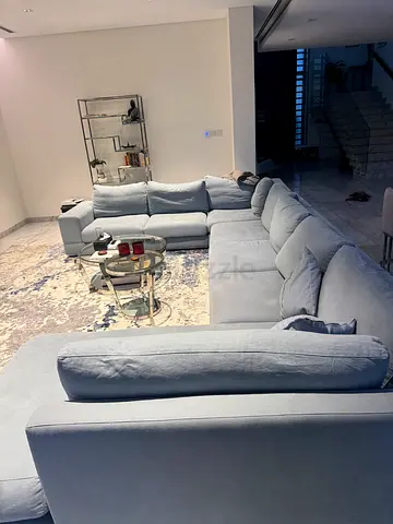 L-Shaped Gray Sofa with Coffee Table