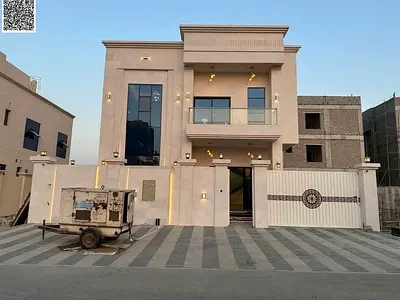 Villa for sale, all-inclusive (registration, ownership, electricity, and air conditioning), on the main street, ready to move in, in one of Ajman's mo