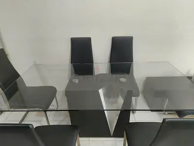 Modern Glass Dining Table with Sleek Chairs
