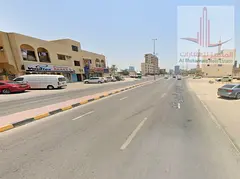 For sale.Commercial residential land .Ajman walk