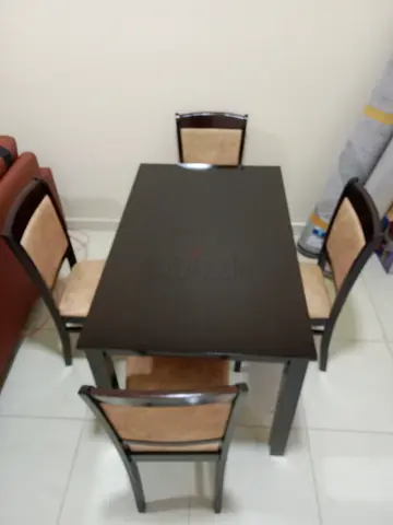 Stylish Dining Table with Four Chairs