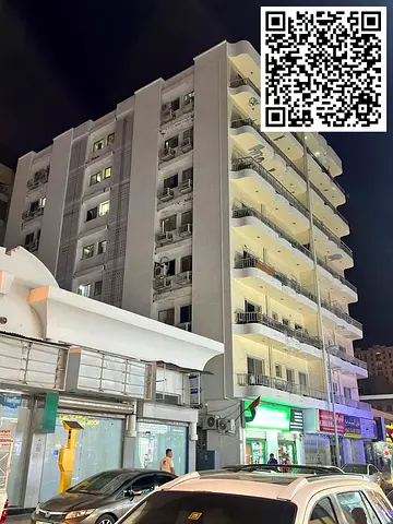 Building for sale in Al Rolla area, Sharjah. 28 apartments (two bedrooms and a living room), spacious apartments, each with two balconies. 13 commerci