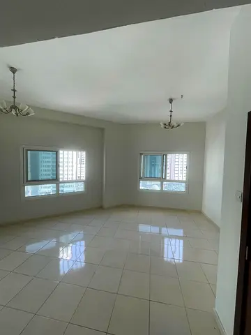 Two bedroom apartment with living room for rent in Al Majaz 3 opposite Al Safya Park central AC good space prime location near all services rent 4200