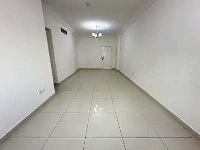 1BR apartment for rent in Al Taawun Sharjah, spacious with kitchen and bathroom, prime location near services, 37000 AED yearly, 4 cheques, 2000 depos