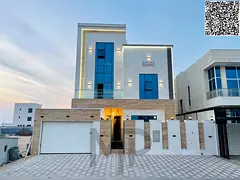 Luxury villa for sale in Al Bahia area, featuring two floors and a rooftop terrace. Modern design, s