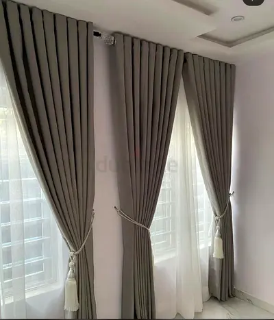Elegant Grey Drapes with Sheer Curtains