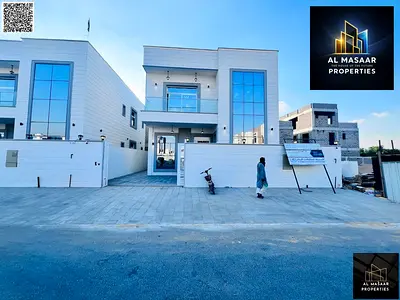 Villa for sale, including registration and ownership fees, water, electricity, and air conditioning, near Sheikh Mohammed Bin Zayed Road. Financing av