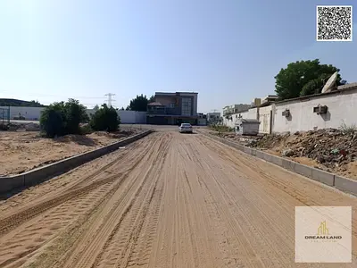 Townhouse plot (ground floor + 2 floors) for sale in Al-Haliyo 2 | Directly on a main street | 12-meter setback and large front parking spaces