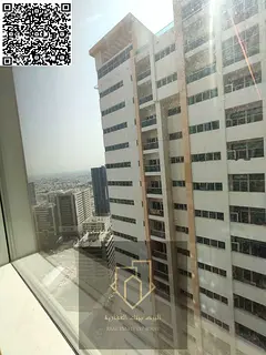 2-bedroom apartment with living room, spacious layout, and a distinctive view of the city and garden